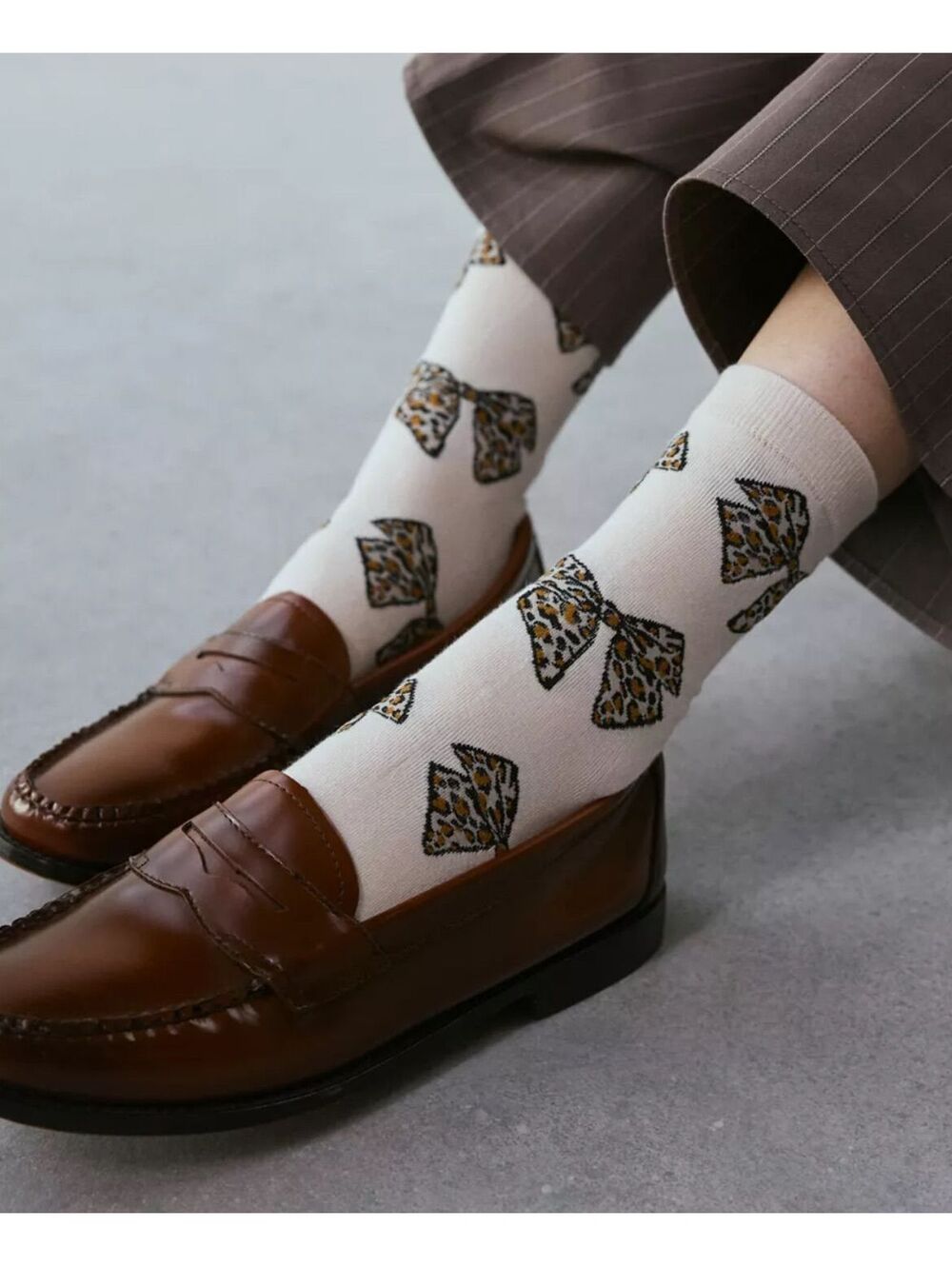 NWT URBAN OUTFITTERS LEOPARD BOW SOCKS